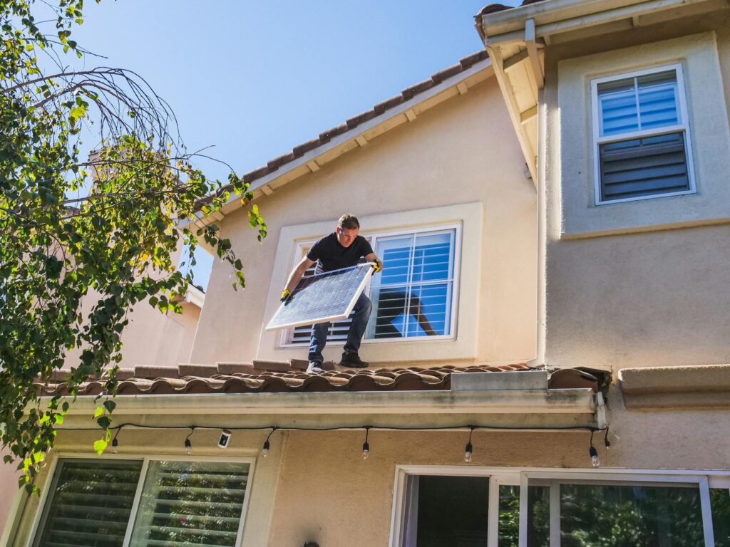 A homeowner installing solar panels to illustrate the adoption of solar energy. — Nevada solar energy policy