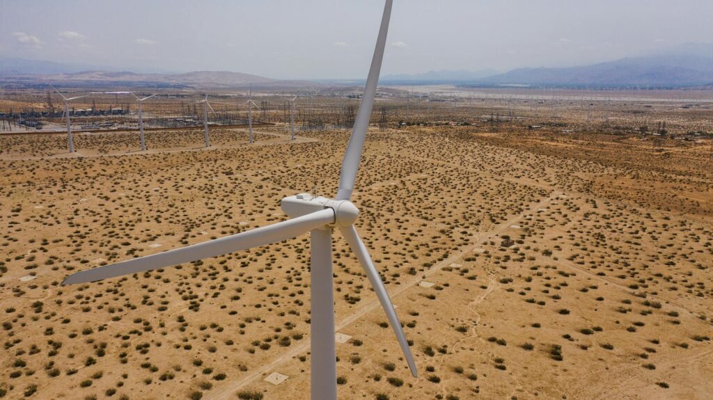 A wind turbine against a backdrop of Nevada's desert landscape — Nevada renewable energy standards