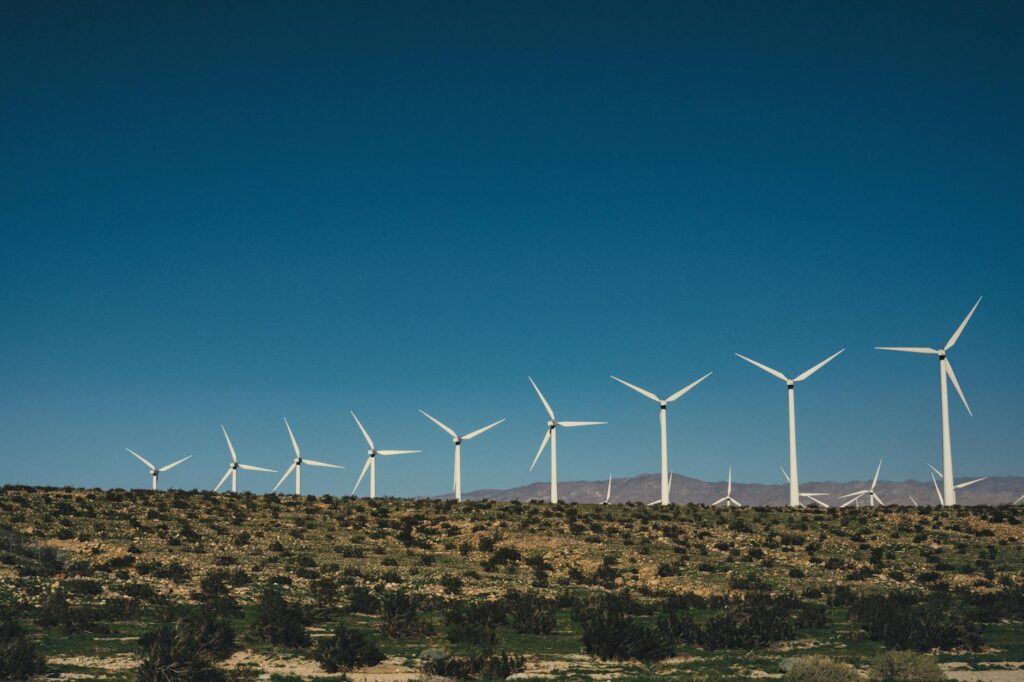 A wind turbine farm in Nevada, illustrating wind energy options available for local businesses. — affordable renewable e…