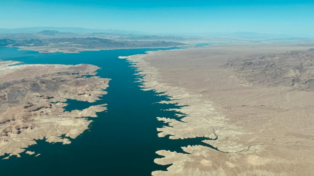 Aerial view of Lake Mead showcasing declining water levels due to drought. — energy shortages water supply Nevada