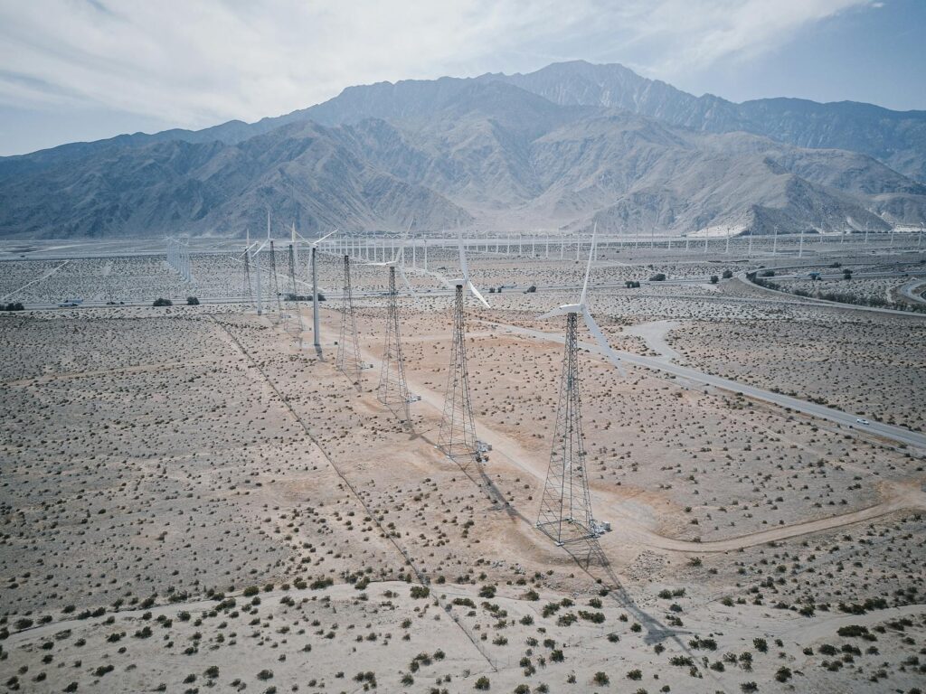 An aerial shot of a wind farm in Nevada, illustrating the potential of wind energy. — renewable energy solutions Nevada
