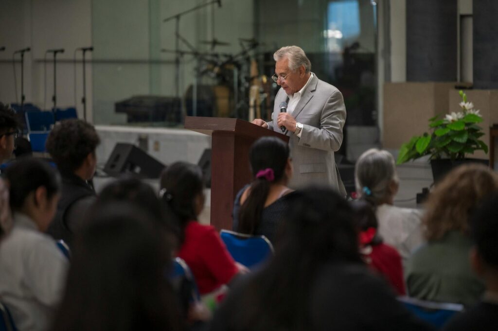 Image of Paul speaking at a community event, showcasing his connection to Nevada residents. — reasons to support Paul Fo…
