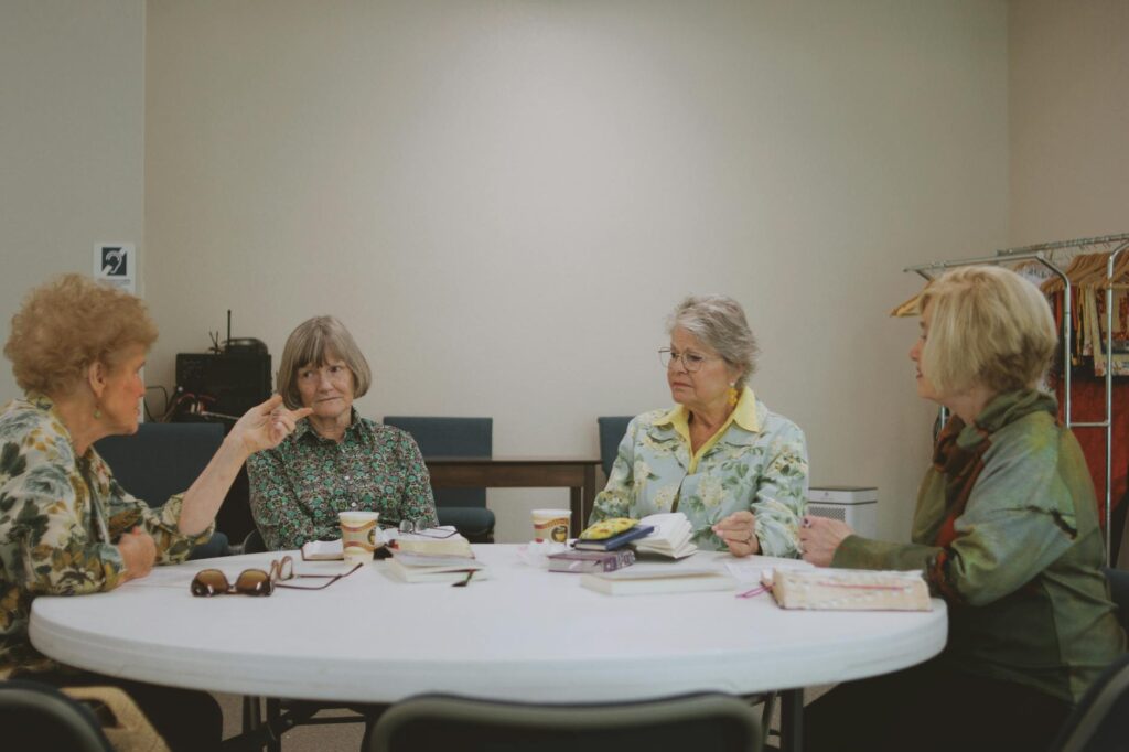 Image of community members engaging in a discussion about education reform, highlighting Paul For Nevada education reform