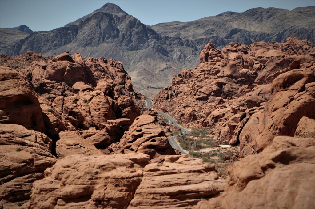 Tourists engaging in sustainable activities like hiking or biking in Nevada's natural parks. — Nevada energy policy tour…