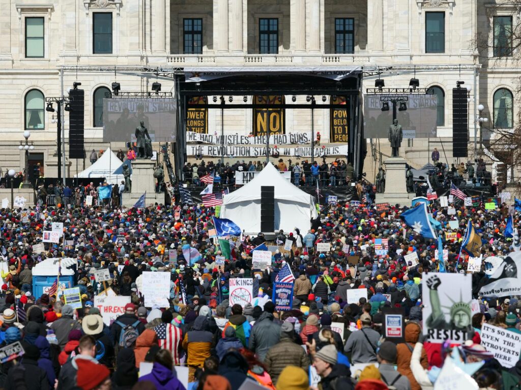 Visual of a diverse group of supporters rallying for Paul, showcasing reasons to support Paul For Nevada.