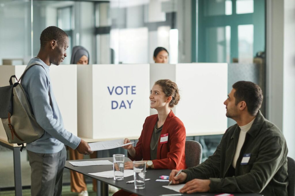 A diverse group of young voters discussing political issues relevant to the Nevada elections. — Paul For Nevada young vo…