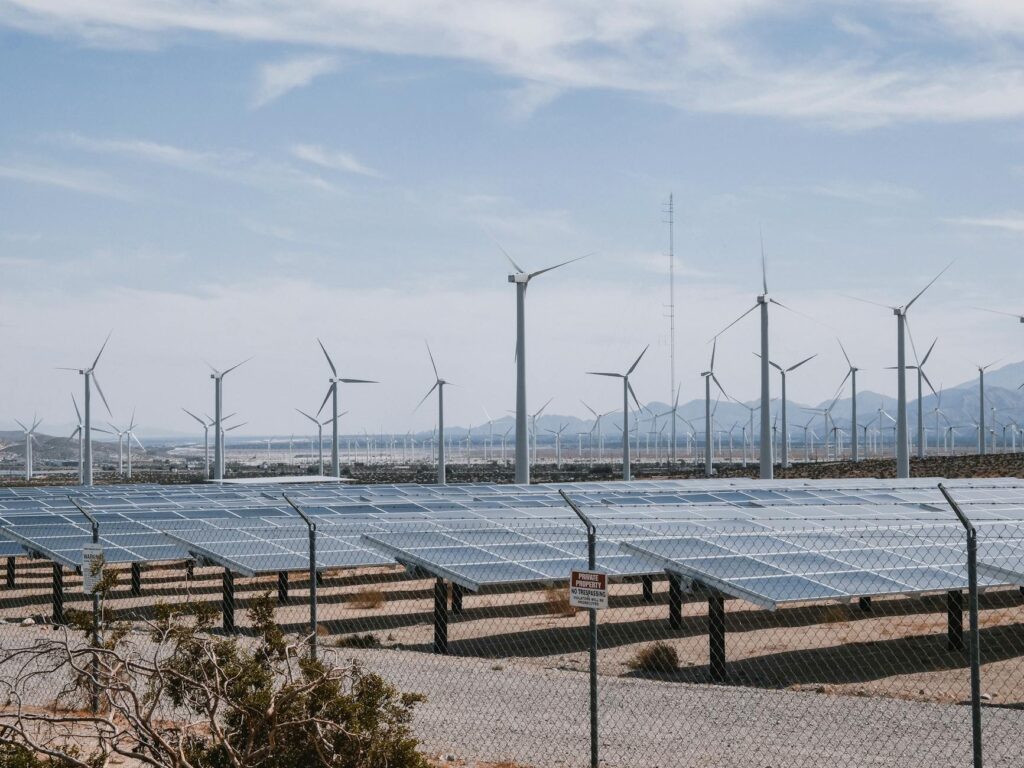 A photo of Nevada's renewable energy sources, like solar panels and wind turbines. — Paul For Nevada climate change policy