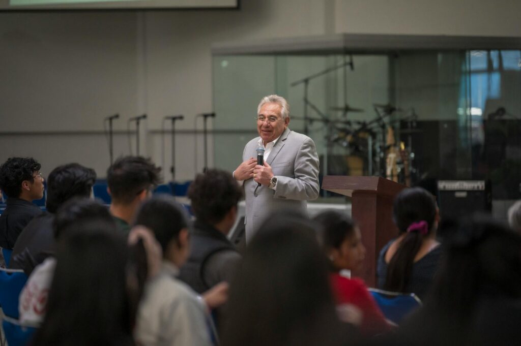 A snapshot of a town hall meeting featuring Paul addressing voter concerns. — Paul For Nevada candidate profile