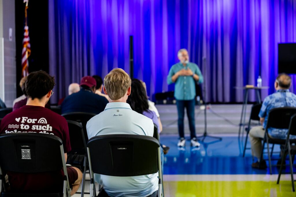 A visual representation of Paul For Nevada discussing education policy at a community event. — Paul For Nevada education…