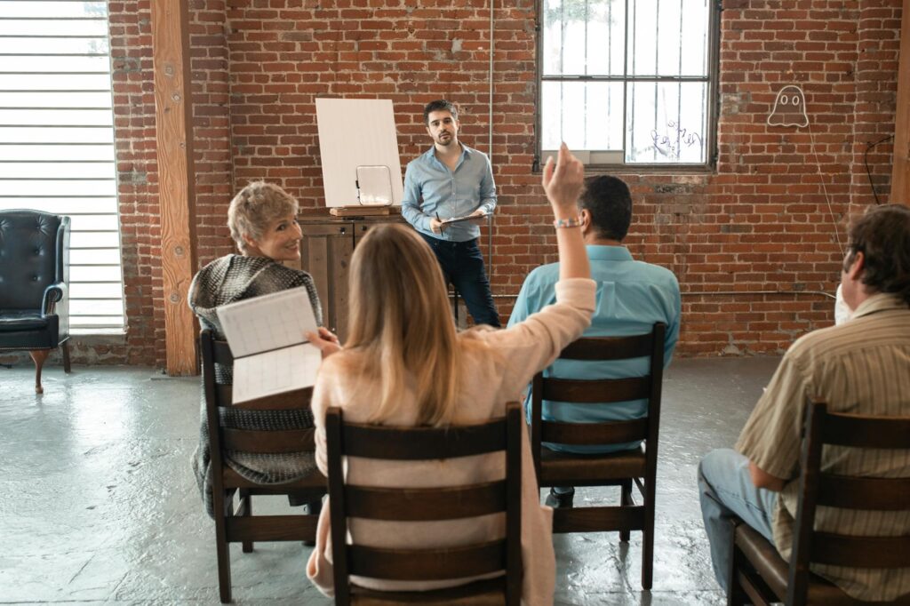 An image of a community meeting discussing education policies related to Paul For Nevada education policy