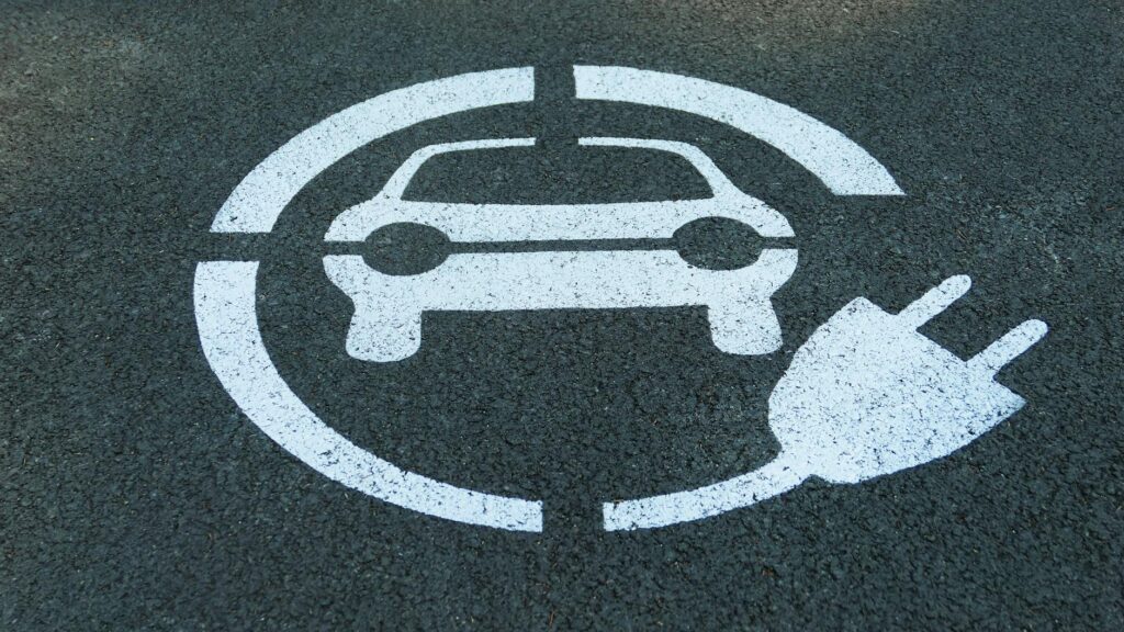 An image of electric vehicles on the road, symbolizing green transportation initiatives. — Paul For Nevada climate chang…