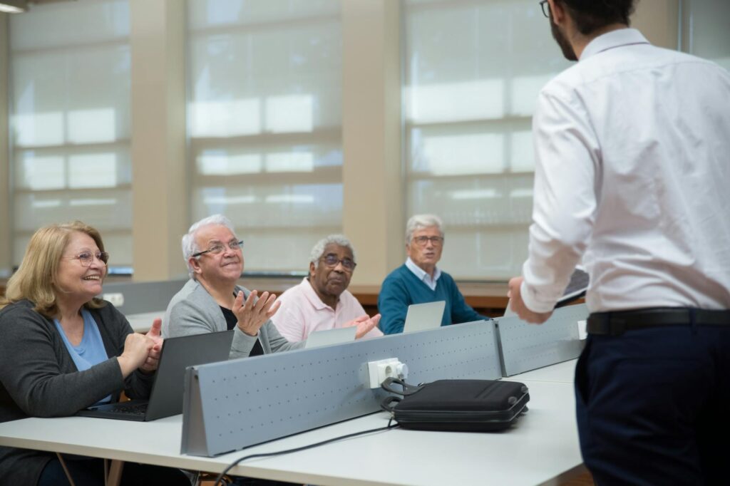 An image of teachers collaborating in a training session. — Paul For Nevada education funding