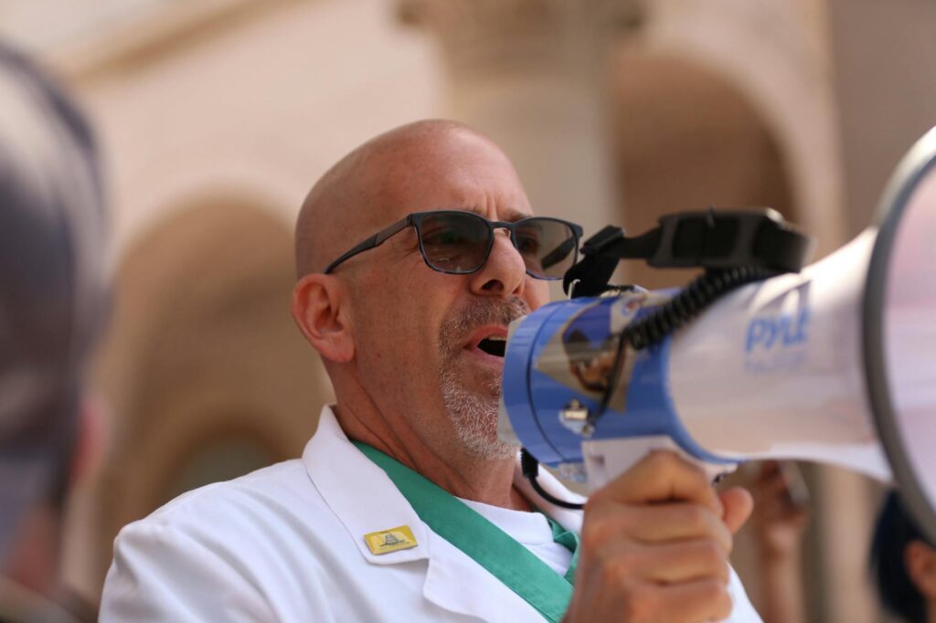 Image of Paul For Nevada speaking at a healthcare rally — Paul For Nevada healthcare policy