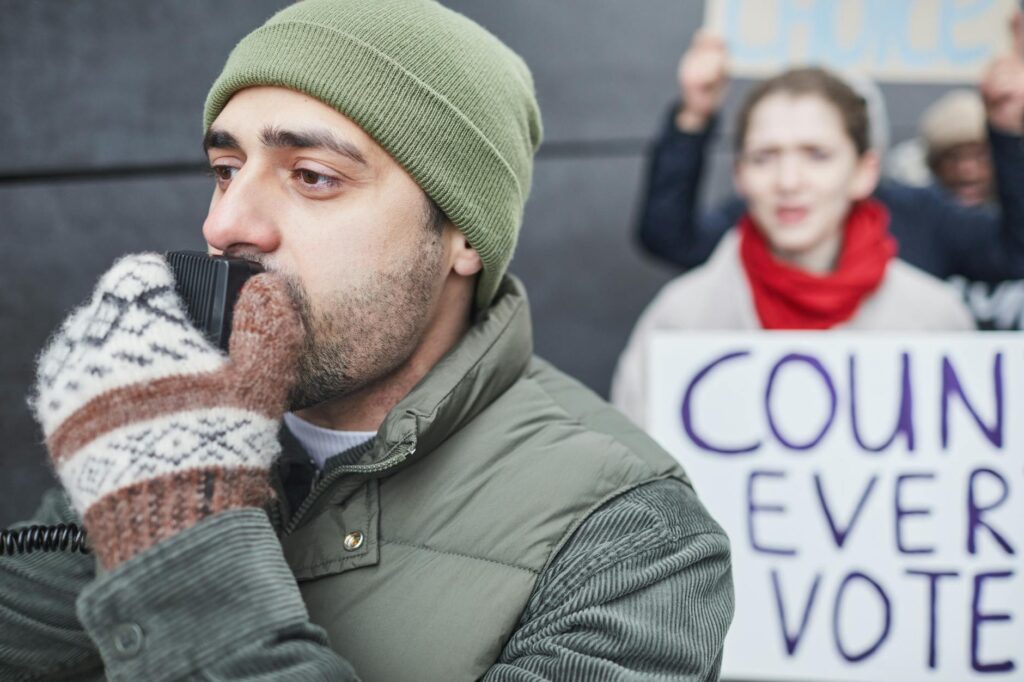 Image of Paul at a campaign rally, showcasing his engagement with voters. — Paul For Nevada candidate comparison
