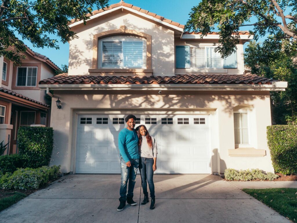 Image of a family in front of an affordable housing unit in Nevada. — Paul For Nevada housing affordability