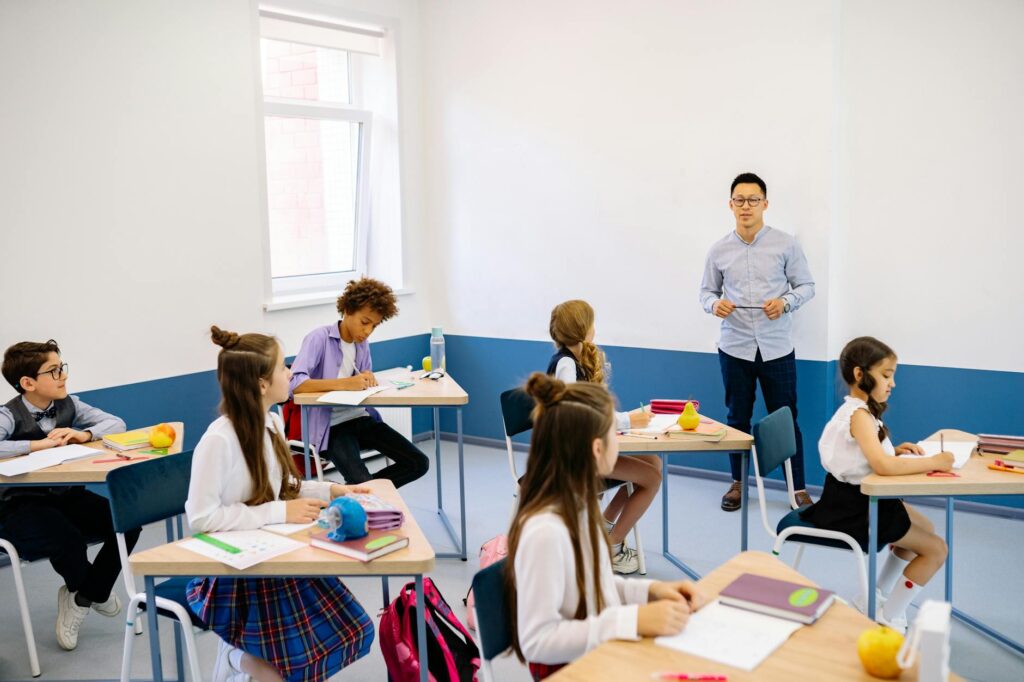 Students engaged in a classroom setting illustrating innovative teaching methods. — Paul For Nevada education reform
