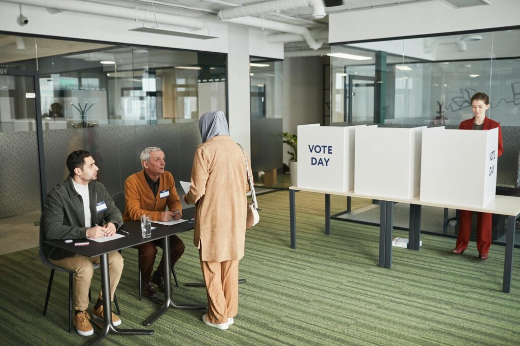 A group of diverse community members engaging in a discussion, symbolizing civic participation. — Why support Paul For N…