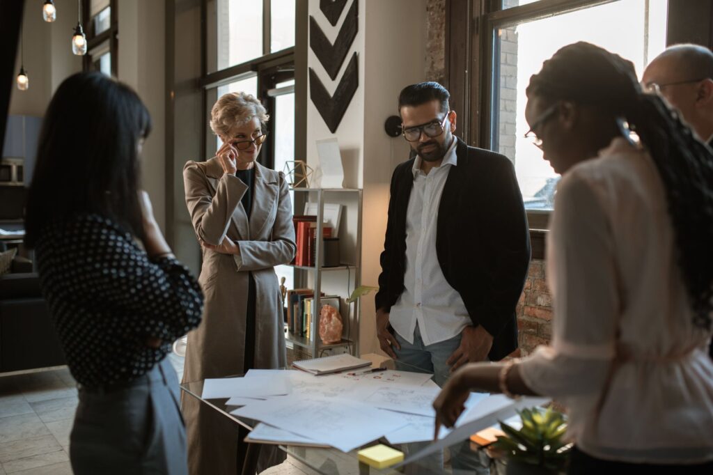 A group of diverse local business owners discussing economic strategies. — Paul For Nevada economic growth