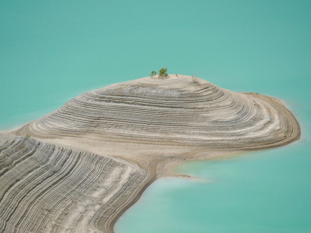 An aerial view of a water reservoir to highlight water scarcity issues. — issues Paul For Nevada addressing