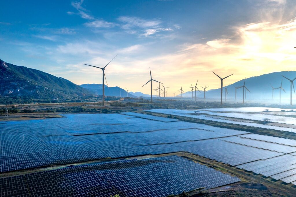 An image depicting renewable energy technologies that may impact future petroleum pricing.