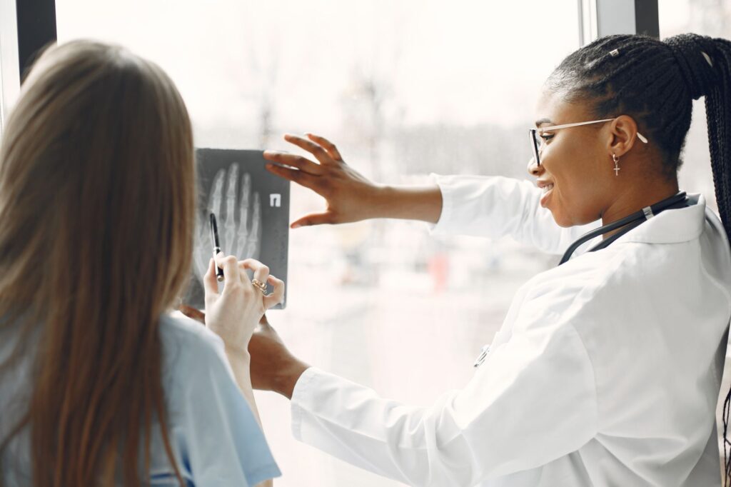An image of a healthcare professional discussing care options with a patient — Paul For Nevada healthcare plans