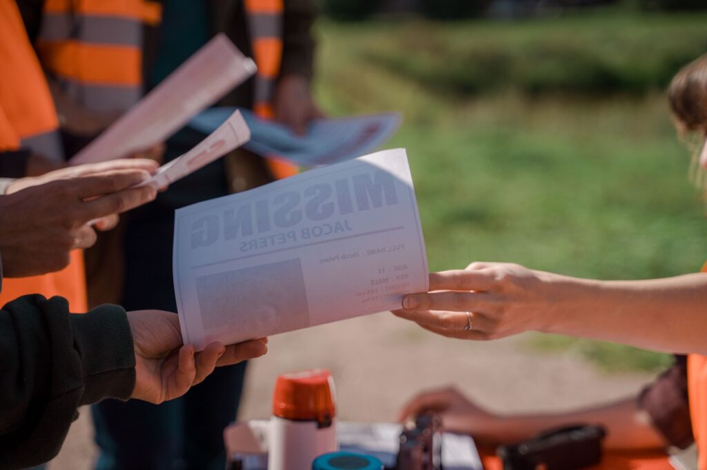 An image of campaign volunteers distributing informational flyers in a neighborhood. — Paul For Nevada community impact