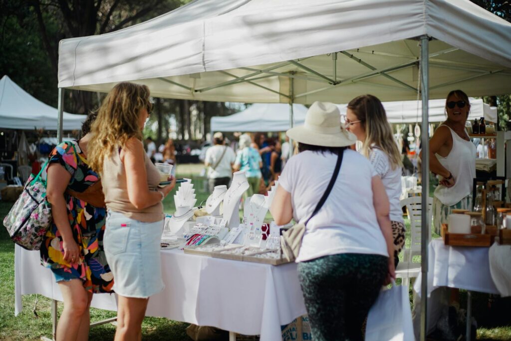 An outdoor community event showcasing local businesses and resources. — Paul For Nevada economic growth