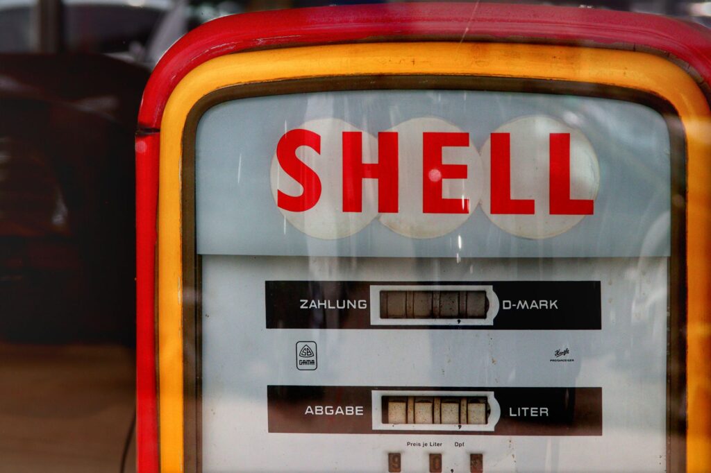 Before and after images of crude oil versus refined gasoline. — crude oil refining process