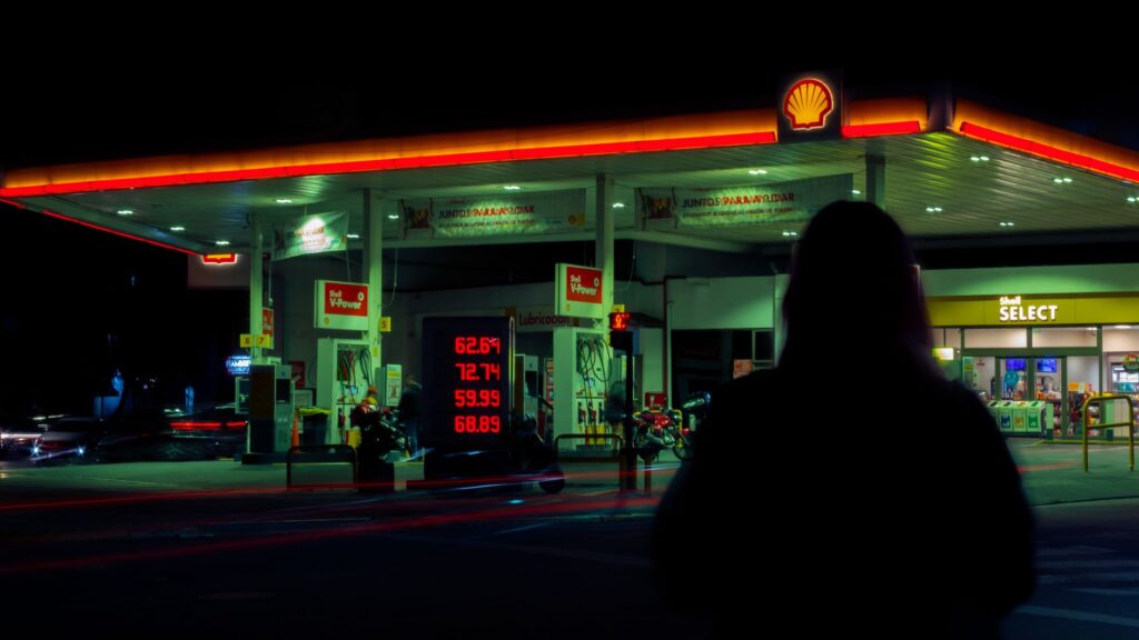 Photo of a gas station with rising prices to illustrate consumer impact. — inflation and fuel prices