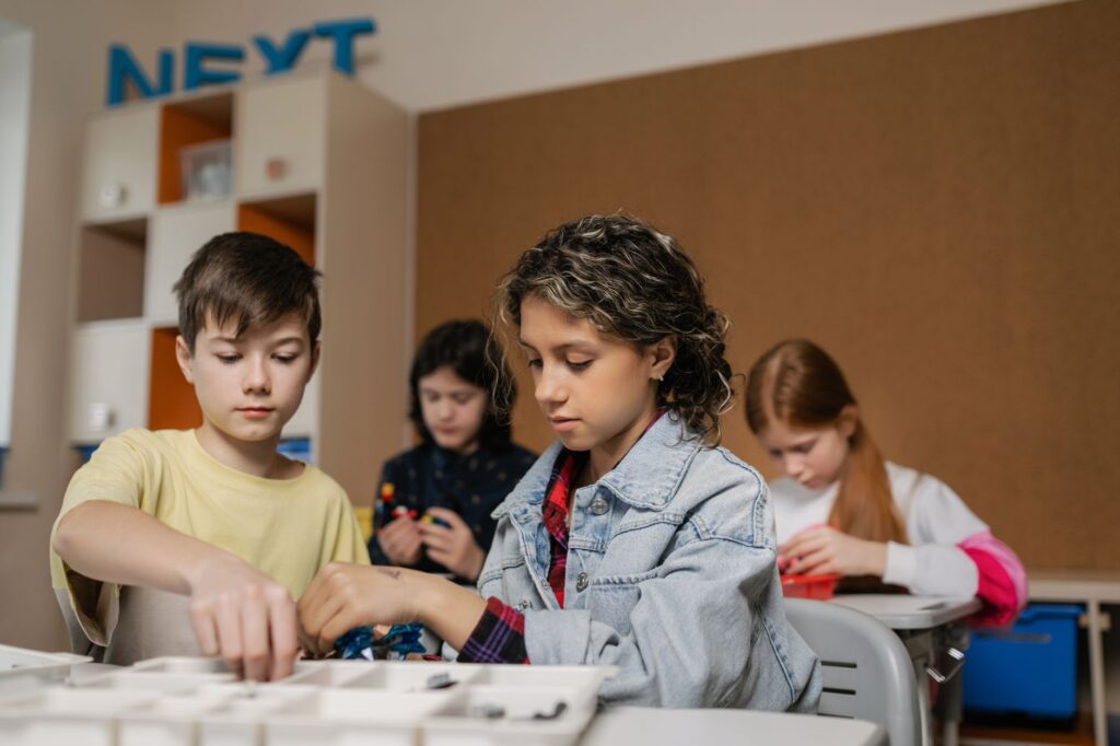 A classroom setting showing students engaged in a STEM activity. — Paul Nevada education policies