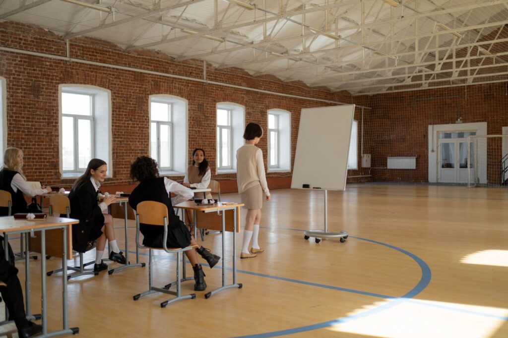 A classroom setting with students learning about energy education. — energy myths