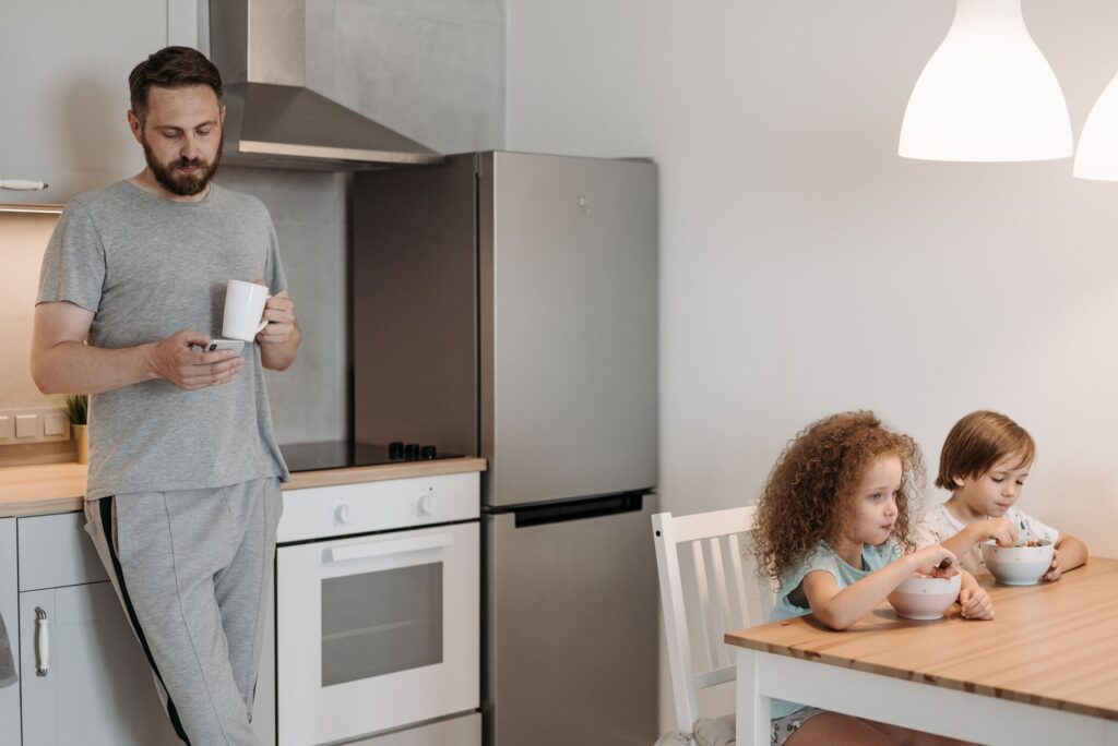 A family using energy-efficient appliances in their home — nevada energy faq