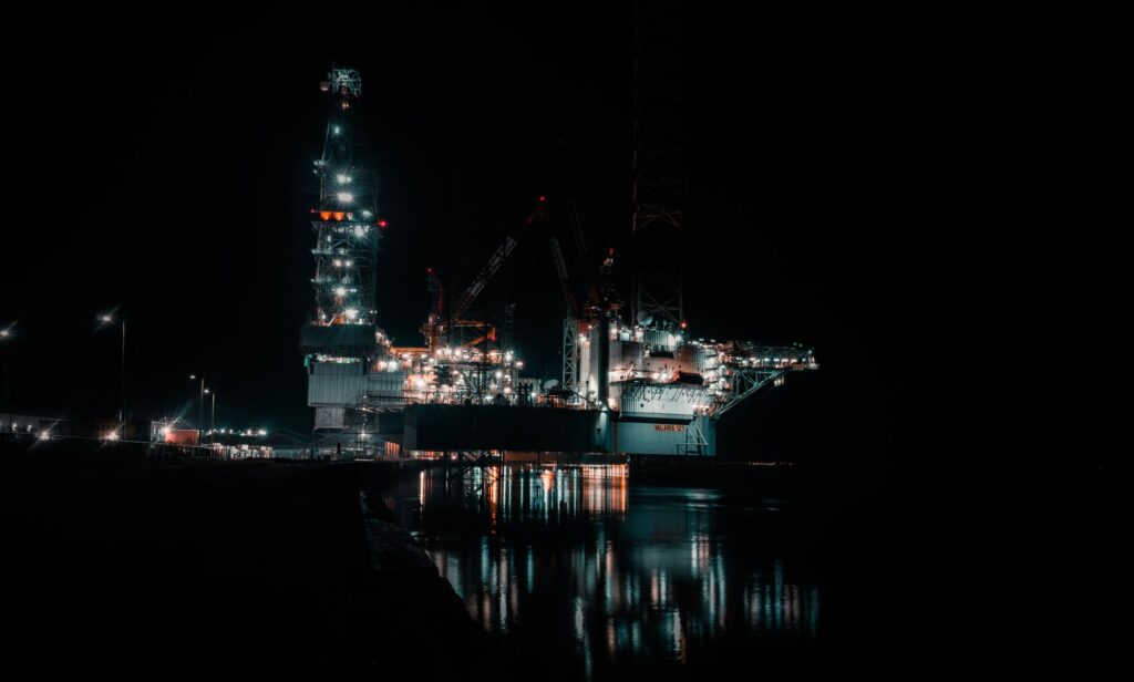 An image of a busy oil rig to depict oil and gas economics. — domestic energy production