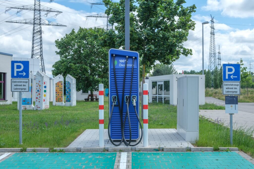 An image of a modern electric vehicle charging station. — ev impact on fuel demand