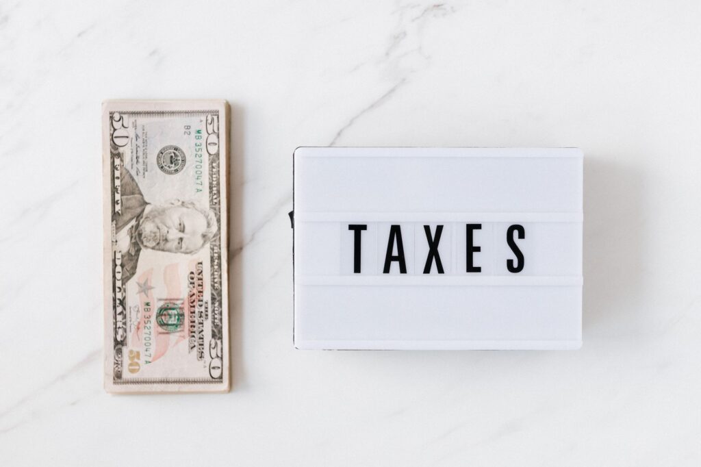 A comparison table of current and proposed tax policies in Nevada highlighting Paul For Nevada tax reforms