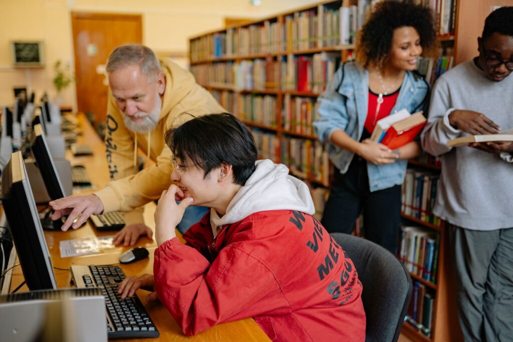 A group of diverse students benefiting from improved educational resources. — Paul For Nevada education initiatives