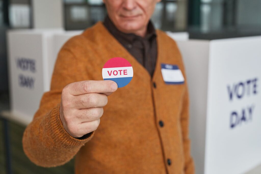 A photo of Paul engaging with voters at a campaign event — Paul For Nevada polls