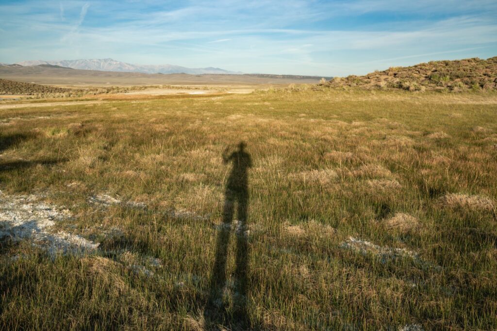 A portrait of Paul For Nevada with a backdrop of Nevada's natural landscapes. — Paul For Nevada environmental policies