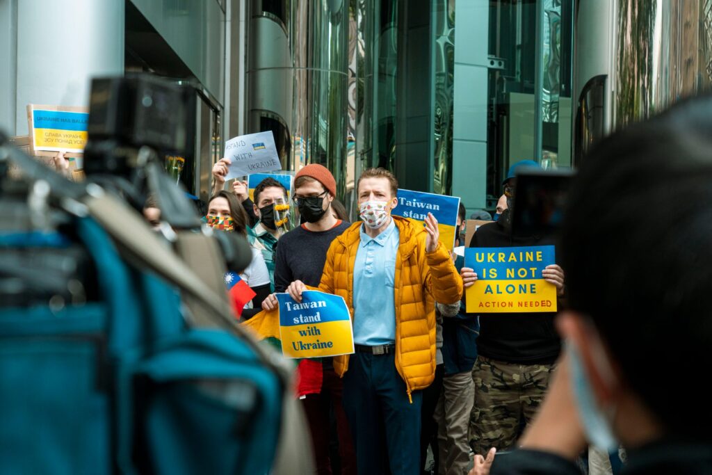 A portrait of Paul standing with supporters at a local rally. — Paul For Nevada grassroots movement