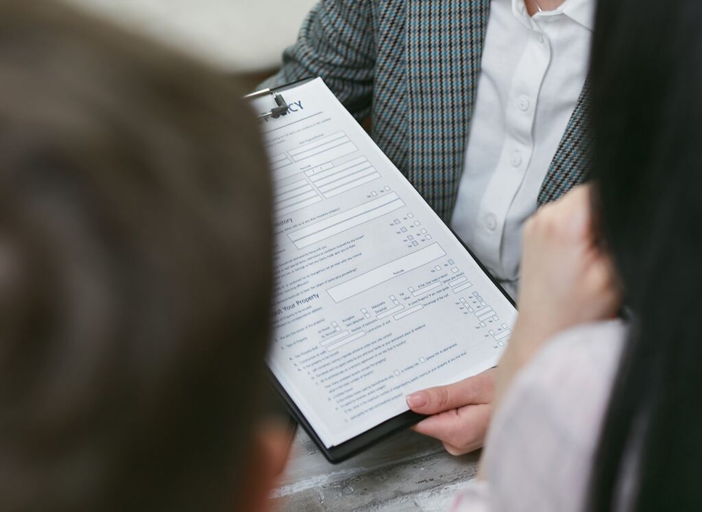 A small business owner discussing policies with a customer in Nevada. — Paul For Nevada small business policies