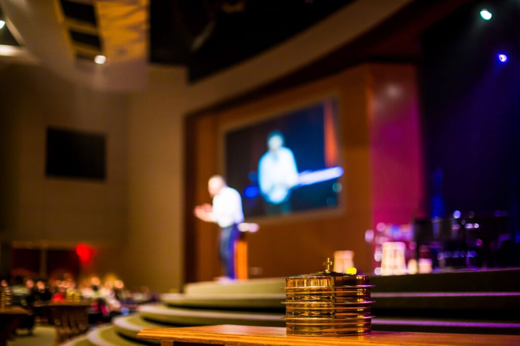 An image of Nevadans discussing healthcare issues at a town hall meeting. — Paul For Nevada healthcare plans