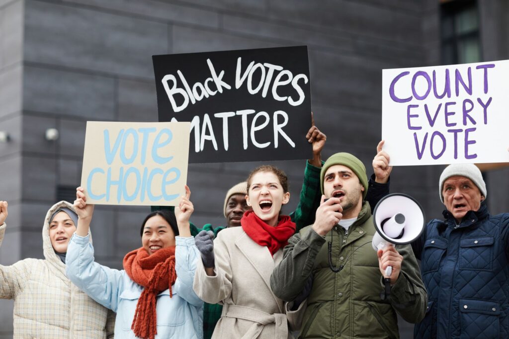 Engaging image of young voters rallying for Paul For Nevada. — support Paul For Nevada