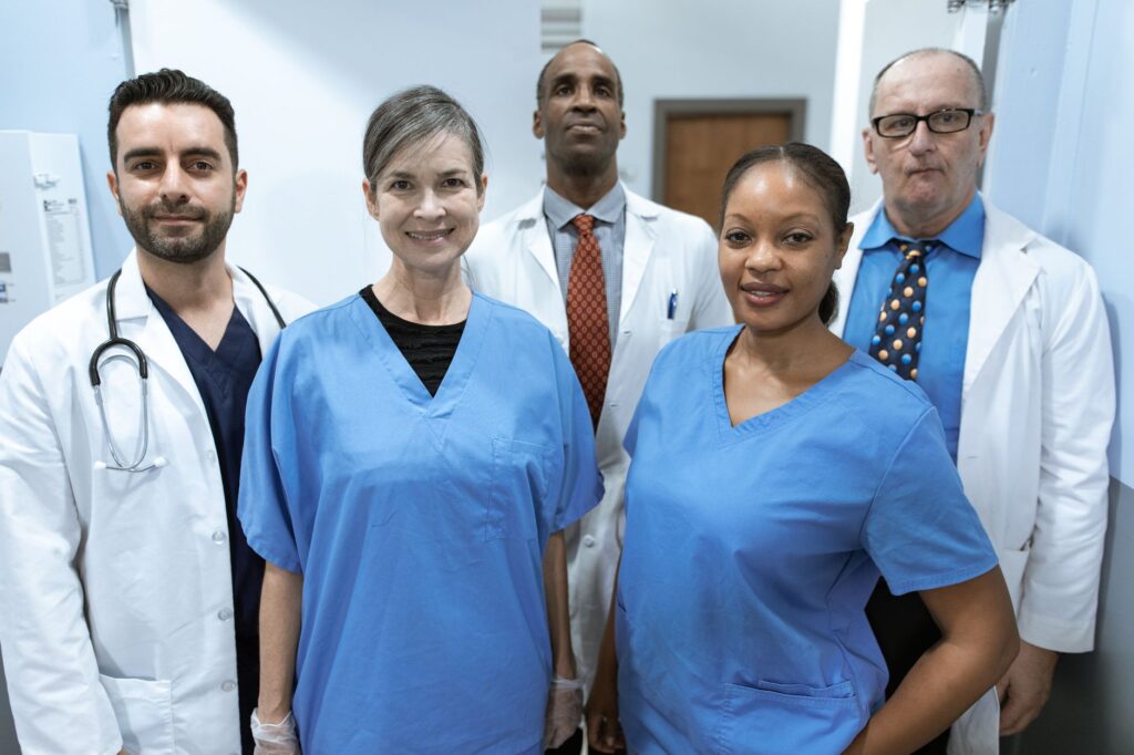Image of a diverse group of healthcare professionals working together in a community health setting. — Paul For Nevada h…