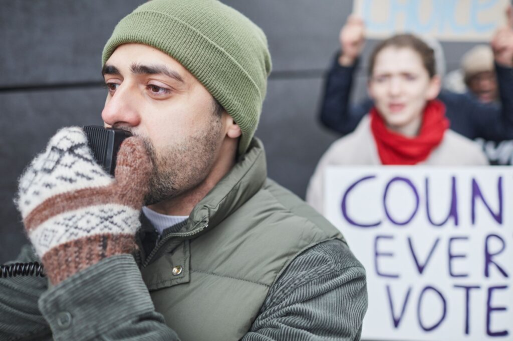 Image of Paul For Nevada at a campaign rally, showing his engagement with voters. — Paul For Nevada comparison