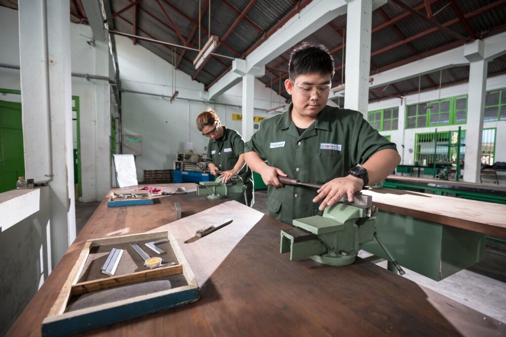 Photo of a vocational training program in action, illustrating the Paul For Nevada economic plan's commitment to workforce development.